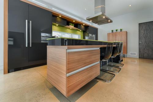Modern kitchen island with integraded drawers